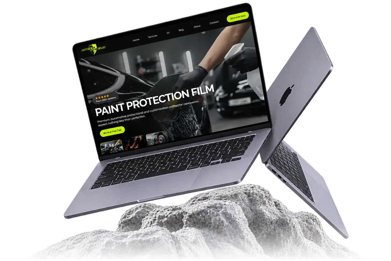 Speed Shield’s website displayed on a laptop above a rocky surface