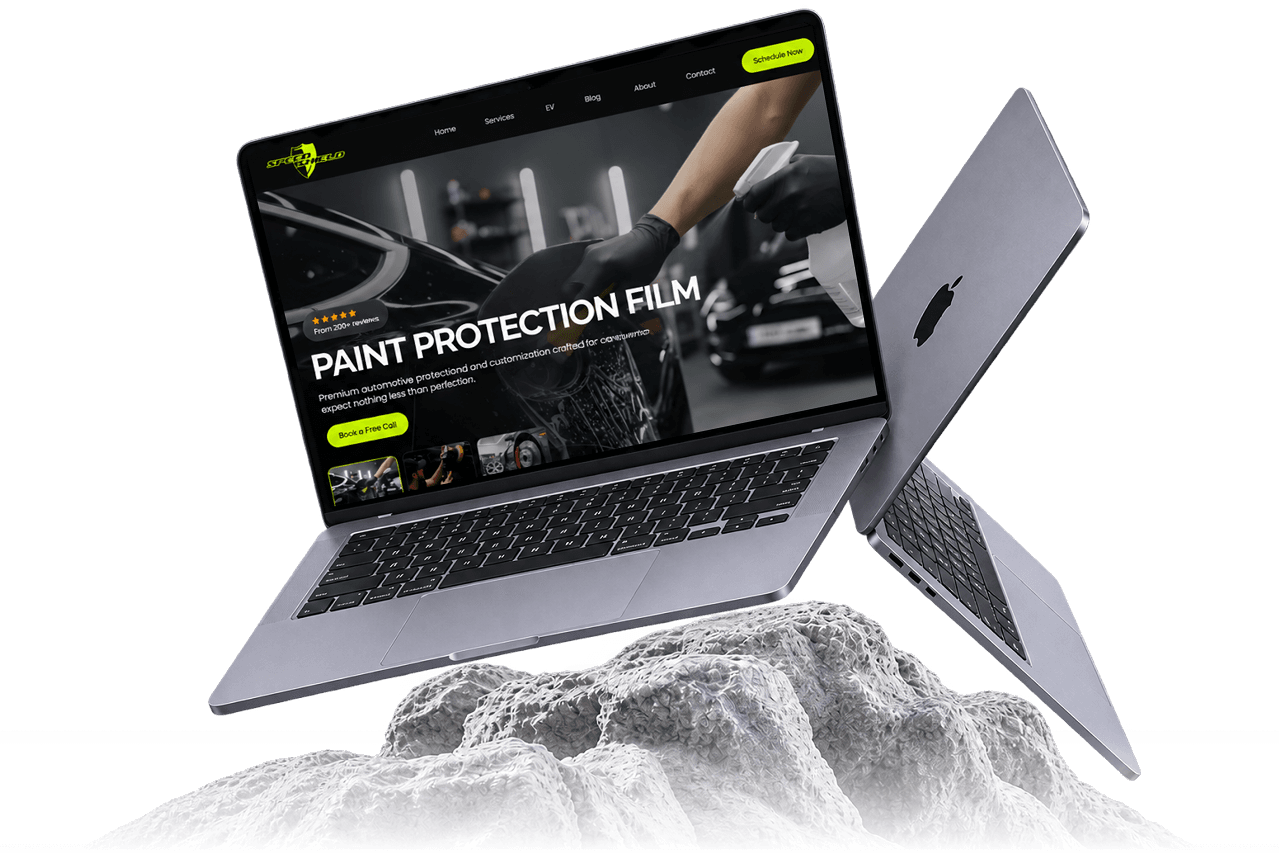 Speed Shield’s website displayed on a laptop above a rocky surface